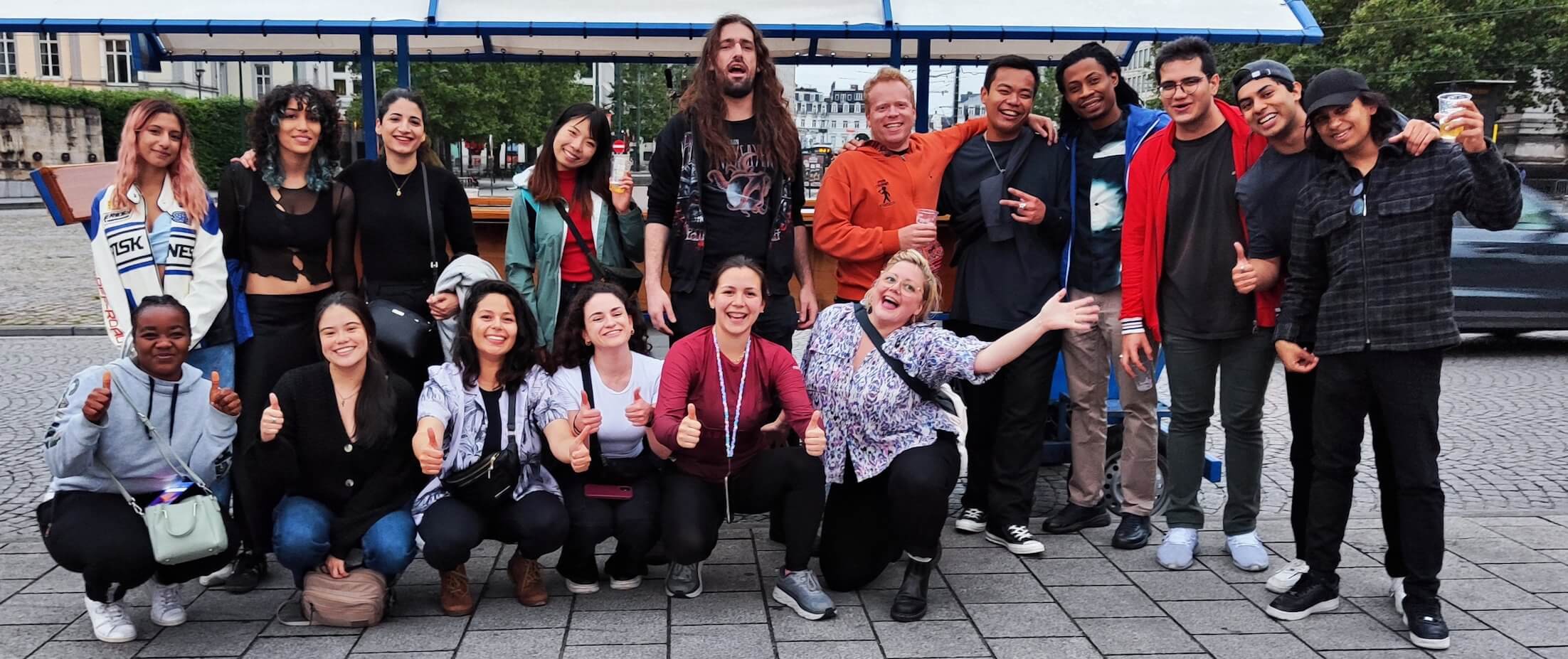 group picture of people in front of the beer bike in brussels